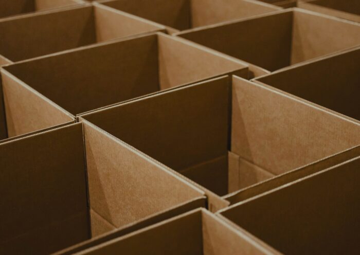 a lot of brown boxes that are open